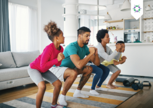 Family exercising together indoors